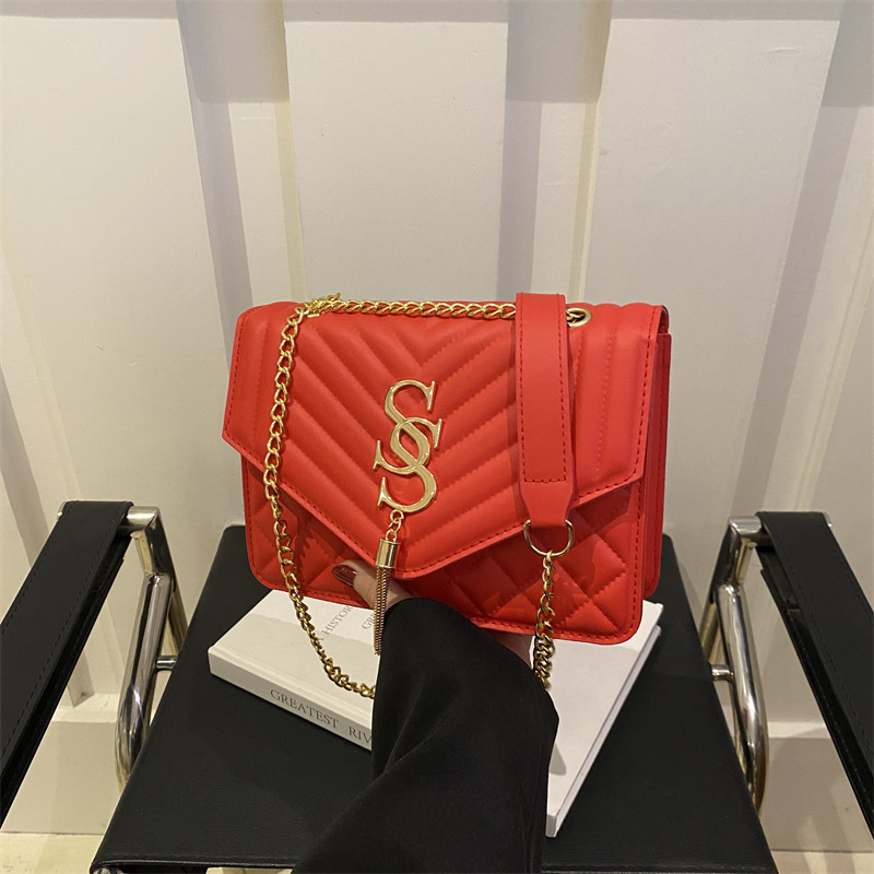 Cadena de hendidura de diamante bolso de hombro para mujeres 2025 primavera y verano nueva moda simple tendencia brazo bolso