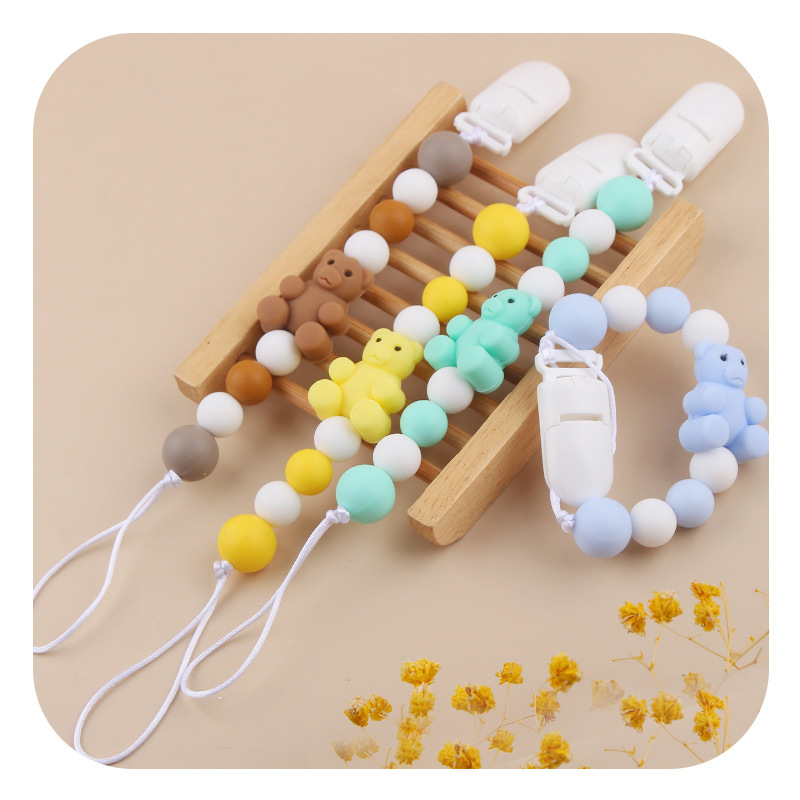 Amazon nueva cadena de tetas de silicona para bebés y bebés, cadena de dientes de molar para calmar la cadena de goma de diente anti-caída