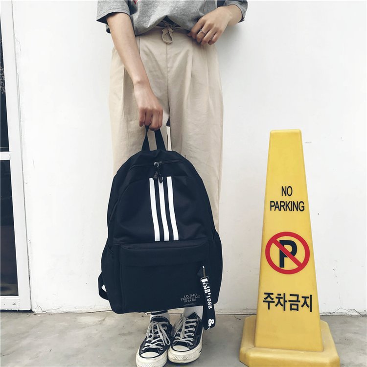 新款双肩包男大容量情侣背包大学高中学生书包校园旅行潮双背