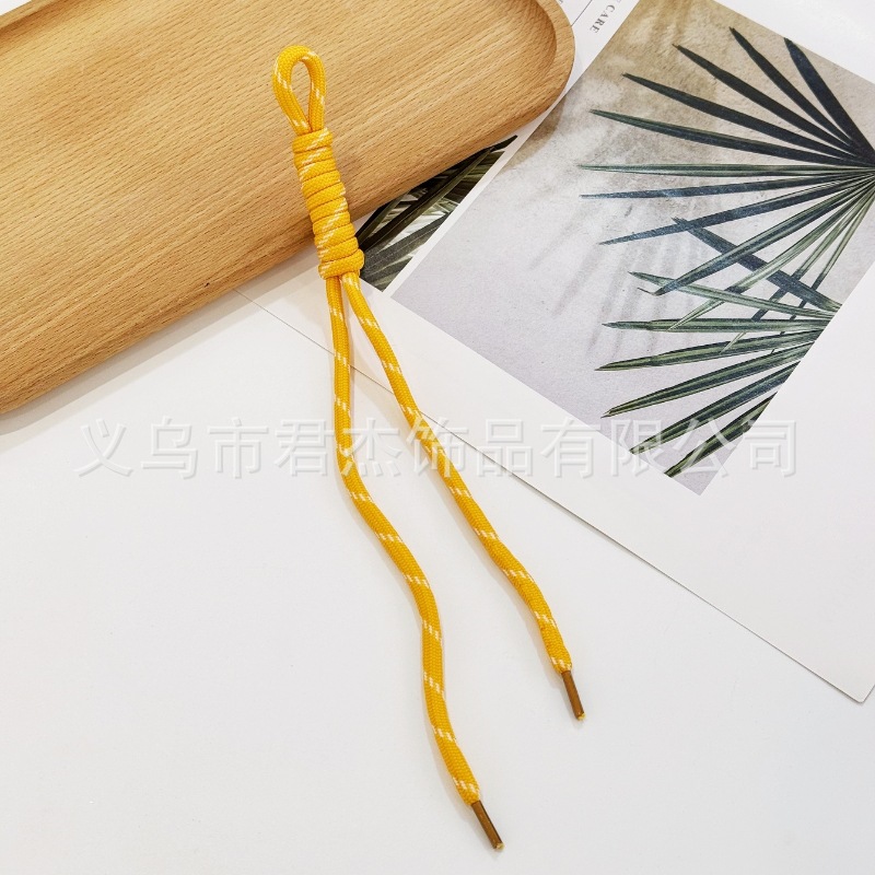 編みカバンのストラップの螺旋の結び紐のiuは鍵のボタンのネットの赤い色の結びの縄の装飾の部品を結びます。