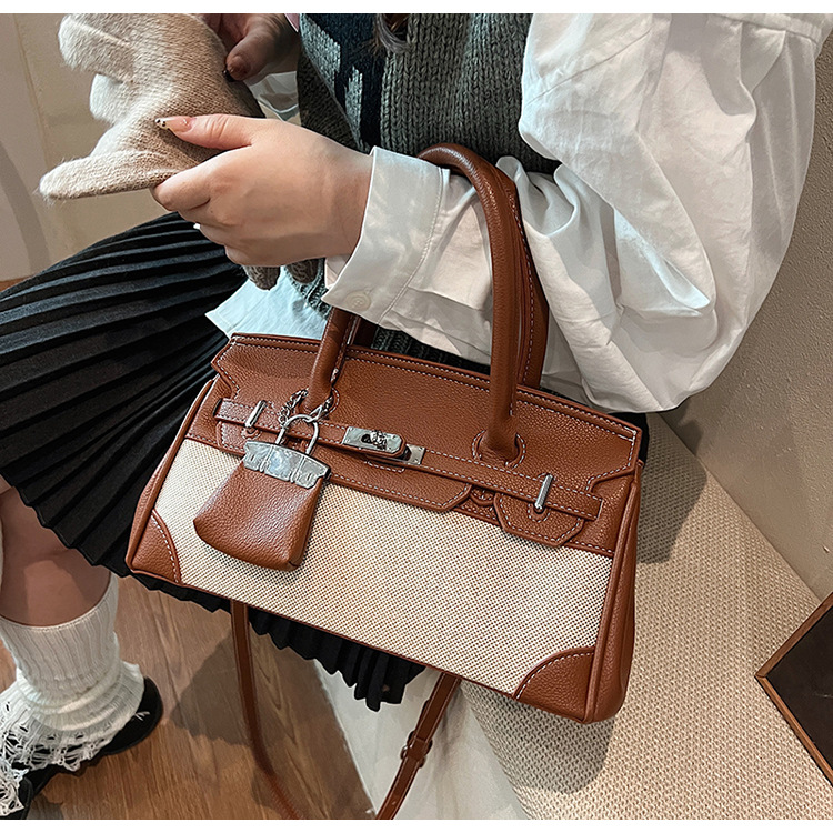 Retro portátil; bolsas de mano de mano de la mujer de comercio exterior transfronterizo al por mayor nuevo lino empalmado de hombro