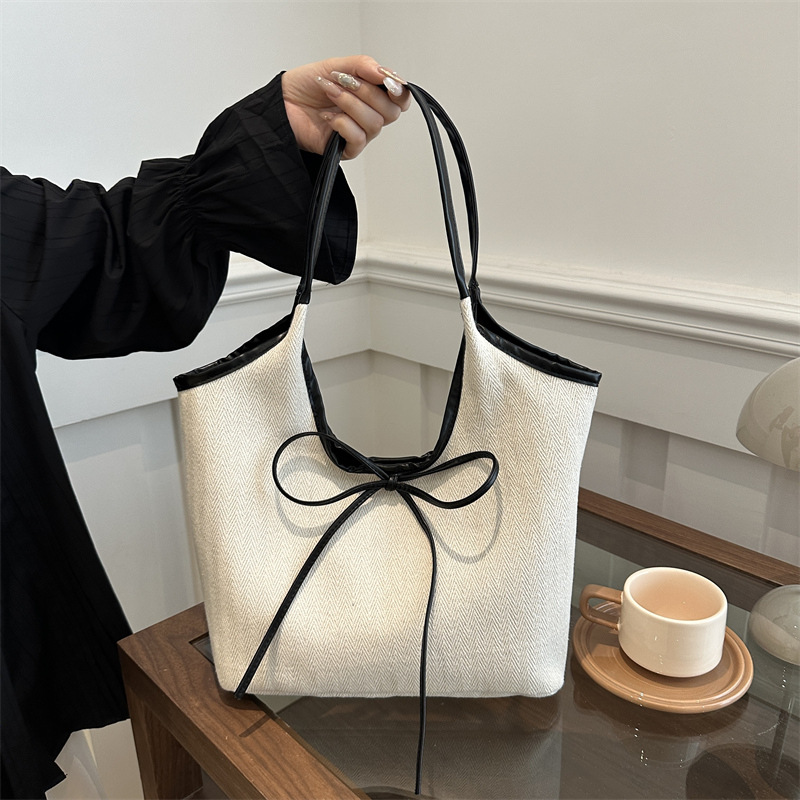 Bolsa de algodón y lino a rayas de gran capacidad para mujeres 2024 nueva bolsa de hombro universal de estilo extranjero