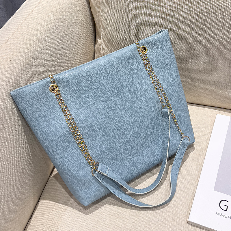 Bolsa de color caramelo tamaño medio 2024, bolsas de damas, bolsas de hombro simples, bolsas de compras para mujeres coreanas.