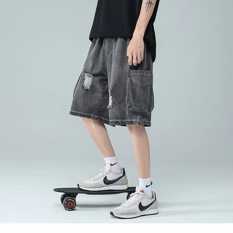 Retro blanco para hacer viejos pantalones cortos de vaqueros de verano para hombres nuevos 2026 sueltos grandes pantalones de moda de piernas anchas