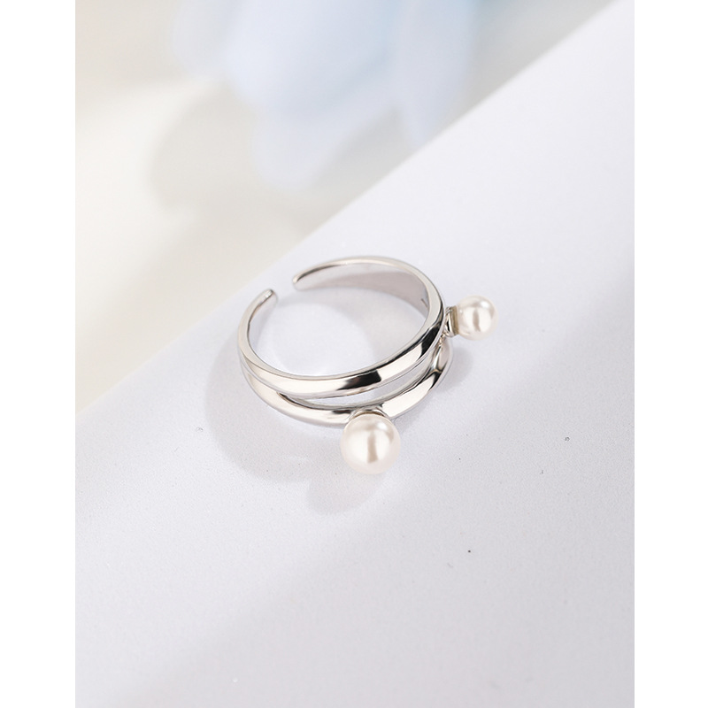 Anillo de perlas de plata esterlina 925 Luz de las mujeres nicho de lujo diseño avanzado anillo de cola ajustable abierto anillo de dedo índice