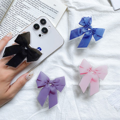 韓國ins手機氣囊支架蝴蝶結純欲簡約小眾可伸縮摺疊桌面看劇支架