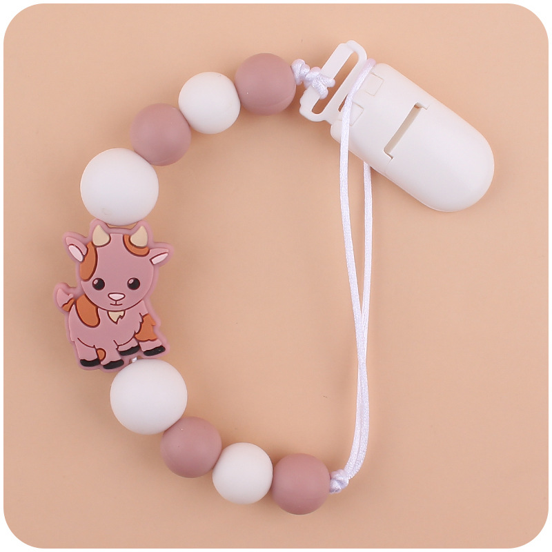 Nuevo bebé suministros chupete cadena creativa de dibujos animados Cordero silicona bebé mordedura cadena anti-gota molar