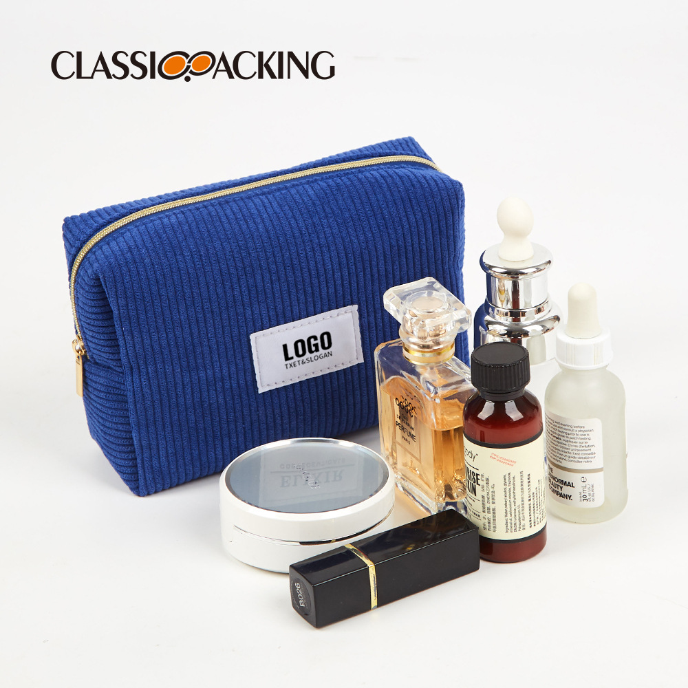 Fabricante de diseño de bolsa de almacenamiento de pana logotipo simple moda rayas bolsa de cosméticos ins bolsa de almacenamiento súper caliente