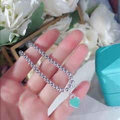 T家のエナメル愛ハート形のペンダントのブレスレットの青い赤い粉は軽くて豪華です。