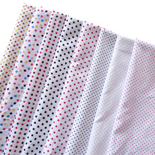 涤纶圆点印花布 桃皮绒白底中小点印花 玩具箱包鞋帽里印花面料