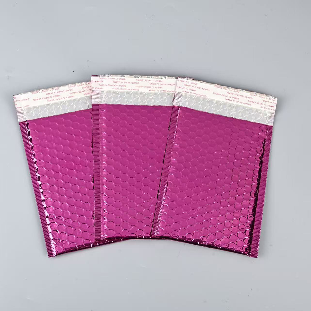 Bolso expreso de espuma de película de aluminio engrosado bolso de burbuja a prueba de golpes de color al por mayor bolsa de embalaje de ropa fabricante de bolsa de espuma engrosada