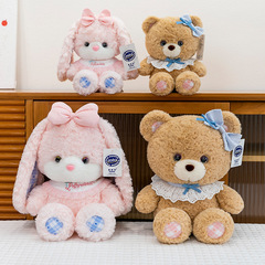国境を越えた泡芙ベアーはかわいい萌え人形ウサギのぬいぐるみの女の子が枕を抱いて寝ている人形