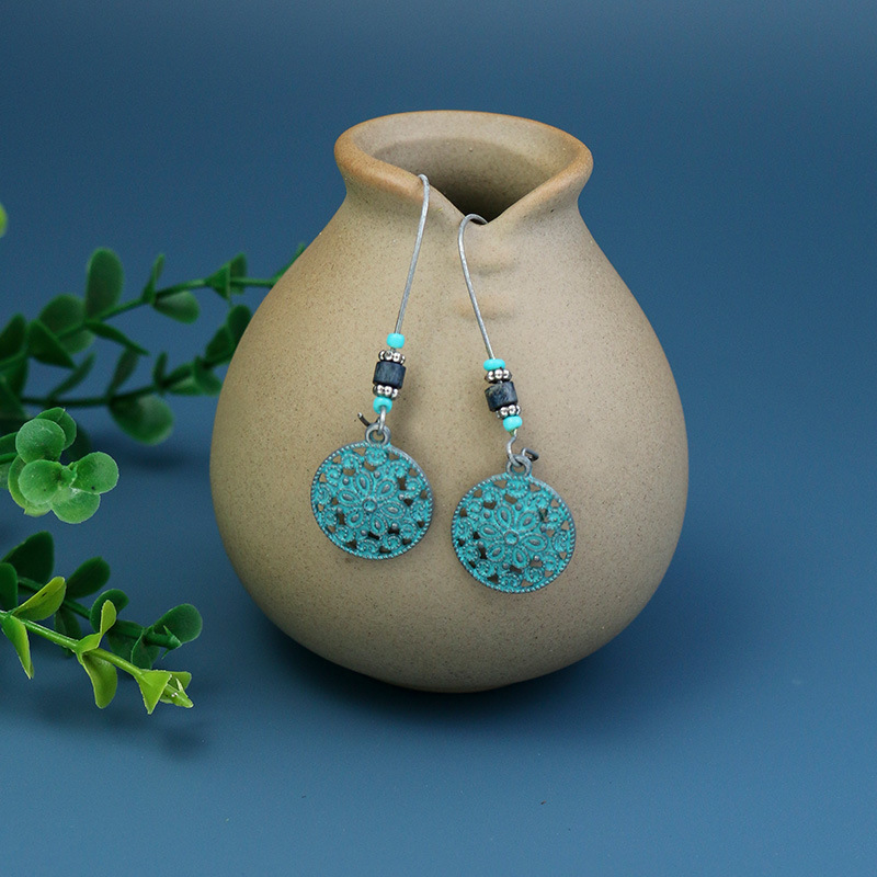Wholesale Jewelry 1 Pair Bohemian Leaf Round Sun Alloy Turquoise Drop Earrings display picture 2