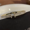 Golden bracelet with letters