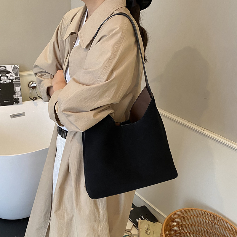 Bolsas de mano retro transfronterizas de mujer texturas bolsas de cubo de agua mujeres otoño y invierno 2025 nuevo mochila esmerizada bolsas de brazo de viaje