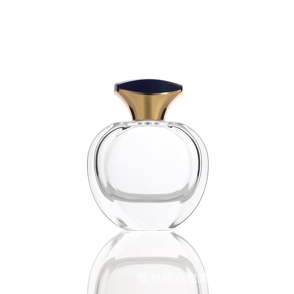 Botellas de perfume de fondo redondo y grueso de alta gama transfronterizas, botellas vacías de cosméticos de vidrio, botellas de spray de perfume de presión 50 ml
