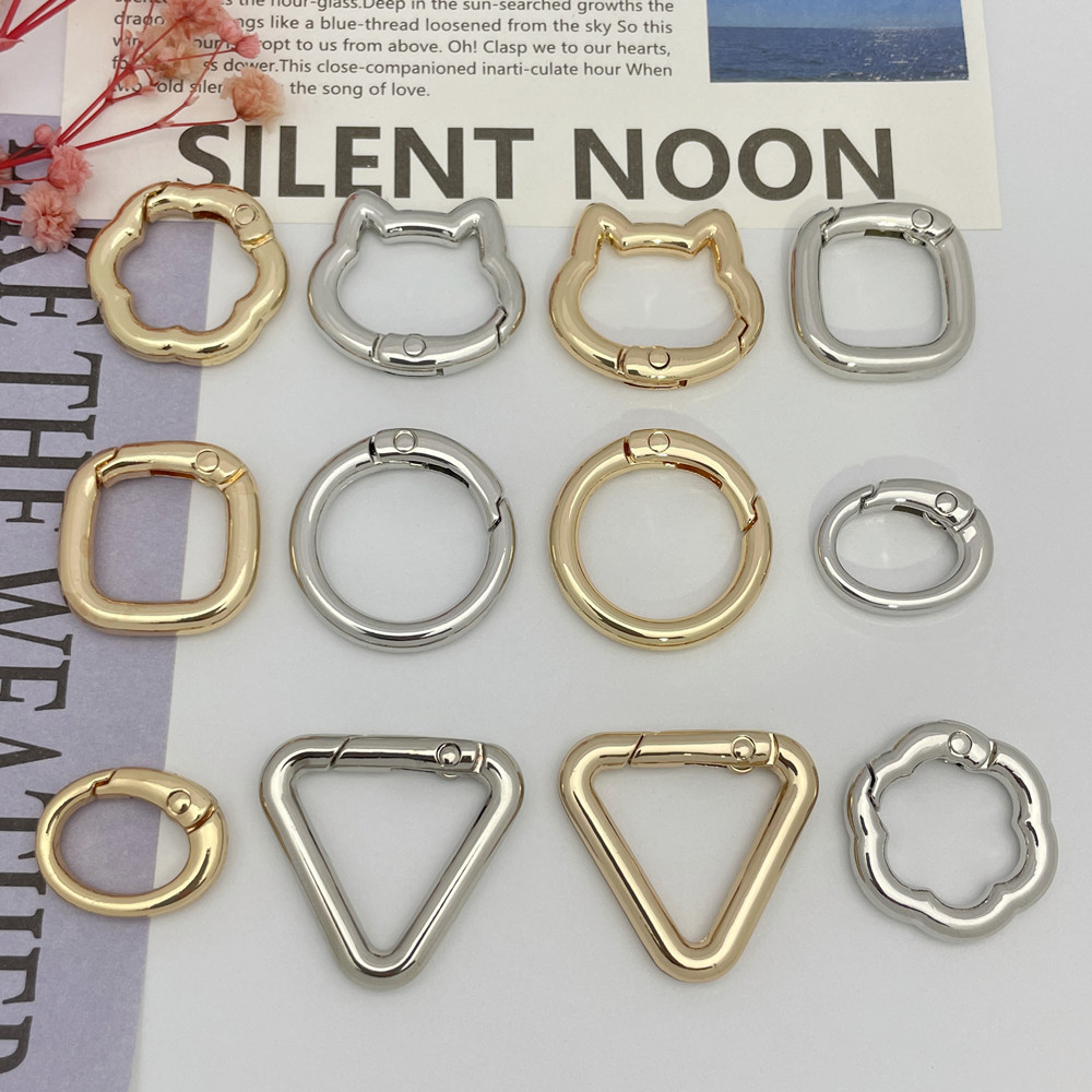 Aleación de zinc colgar joyas de hardware chapada resorte bolsas de ropa colgar llaves DIY accesorios llaveros fábrica al por mayor