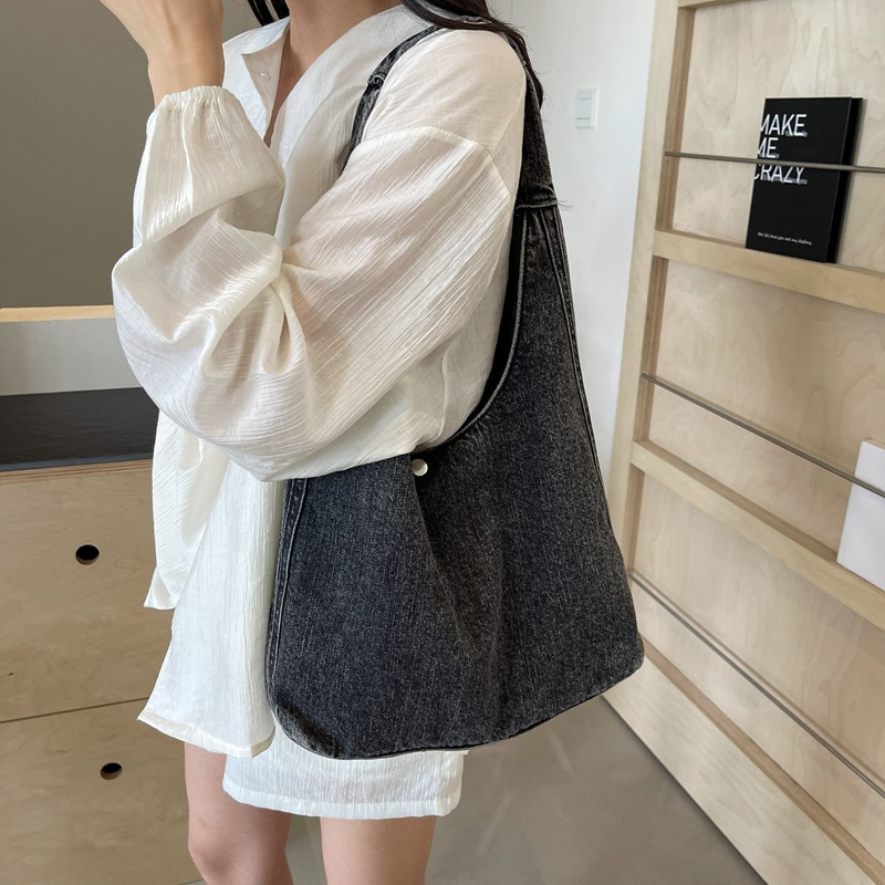 Bolso de mezclilla para mujer 2024 nuevo estilo estilo occidental bolso grande portátil de moda estilo perezoso casual todo fósforo bolso de axila de un solo hombro