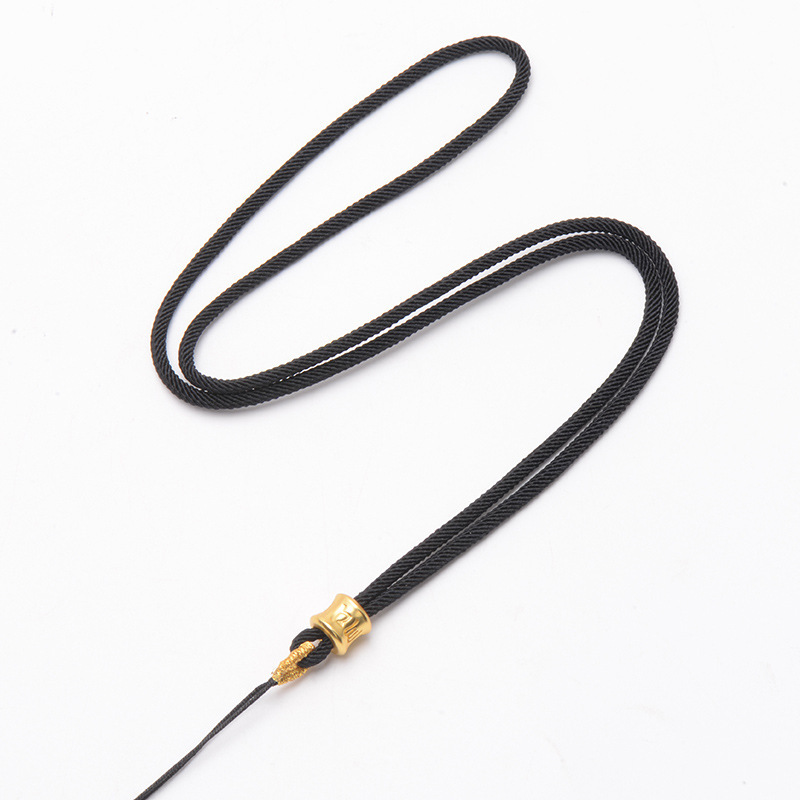Six-character mantra gold beads black