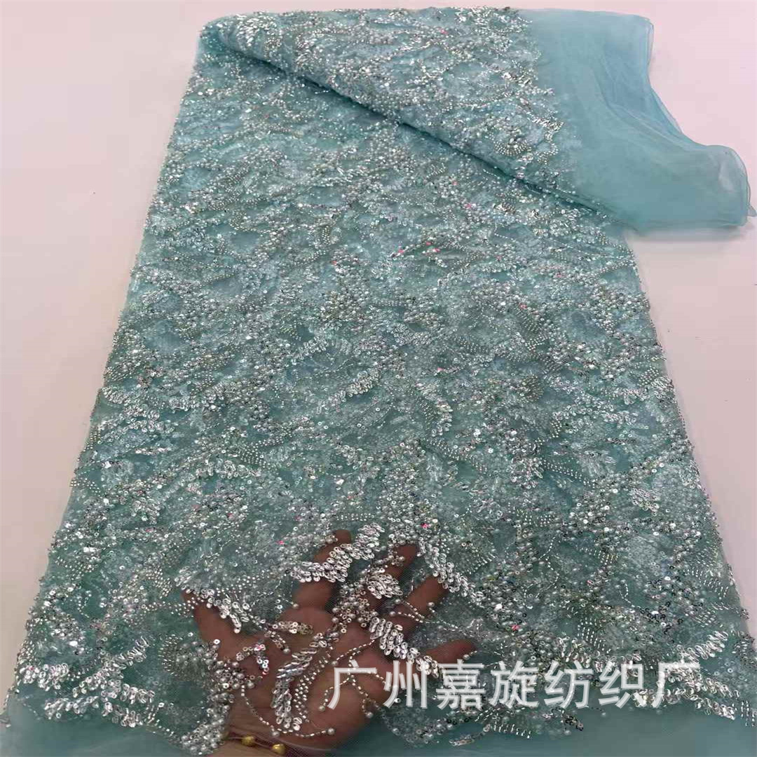Tela de encaje francés con lentejuelas y cuentas bordadas en tubo con un exquisito patrón irregular al estilo francés para vestido de novia.