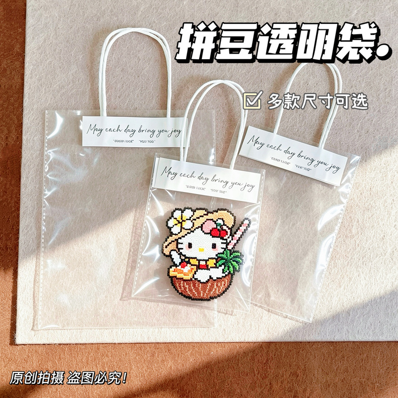 Super cheap trendy transparent tote bag gift bag for accessories, plaster dolls, flower bouquets, and bead crafts shop packaging bag Super cheap trendy transparent tote bag gift bag for accessories, plaster dolls, flower bouquets, and bead crafts shop packaging bag