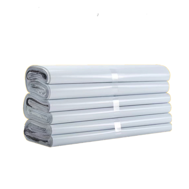 Bolsa exprés engrosada blanca pequeña, material nuevo, bolsa de embalaje logística impermeable autoadhesiva de color, bolsa de embalaje de comercio electrónico