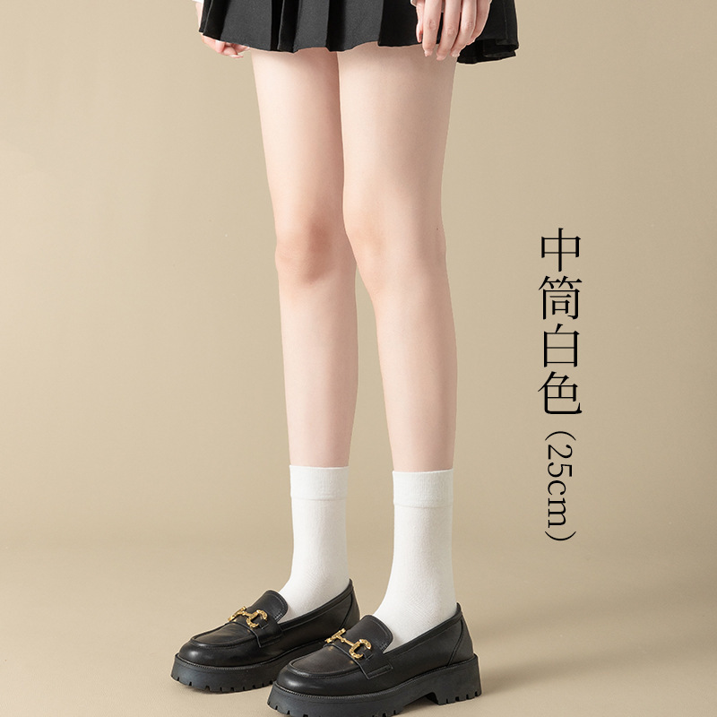 Calcetines de pantorrilla Calcetines de algodón puro de primavera y verano para mujer Calcetines de tubo jk de tubo de estufa de presión para niños Calcetines por encima de la rodilla en blanco y negro Calcetines Zhuji al por mayor