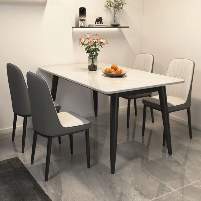 Fábrica directa mesa de comedor de tabla de roca ligera de lujo doméstica moderna simple mesas de comedor y sillas de hierro forjado combinación rectangular para comer