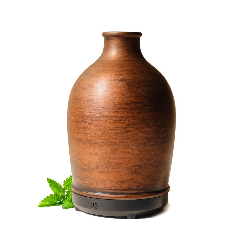 Vaso de viento simple transfronterizo Humidificador de aromaterapia de hotel Humidificador silencioso de aire ultrasónico de resina para el hogar