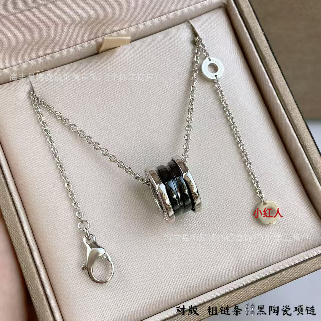 Platinum black ceramic necklace (little red man charity model) / A