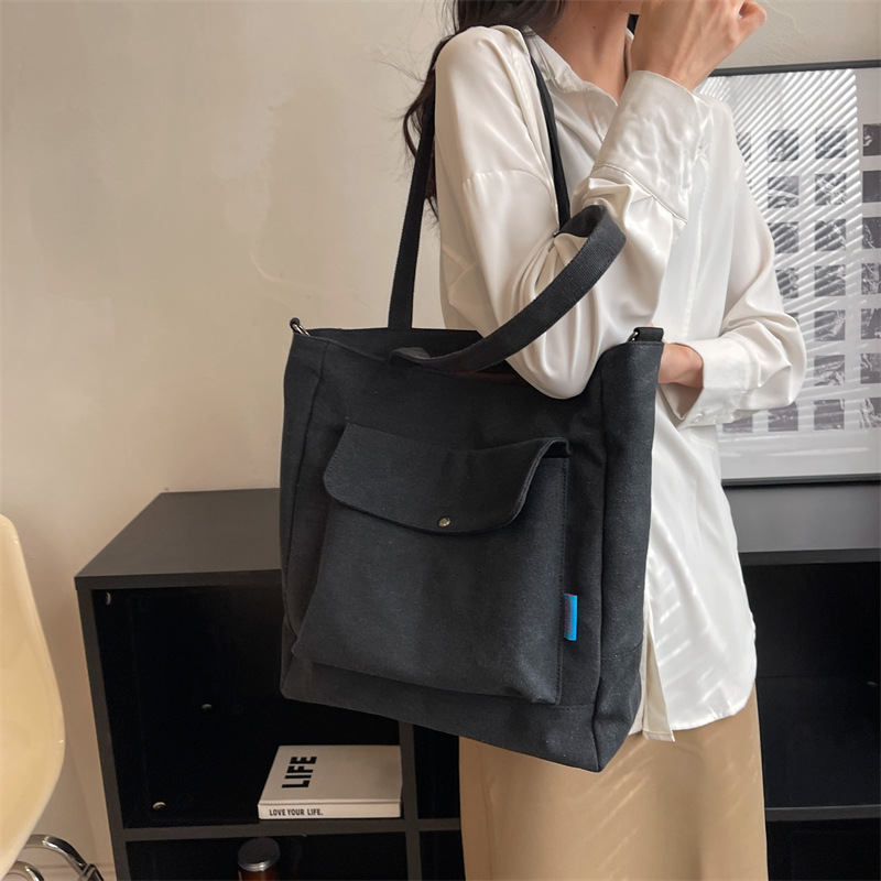 Los fabricantes venden al por mayor el nuevo bolso Tote para mujer bolso de lona de color sólido de gran capacidad bolso de mensajero de hombro casual de moda simple