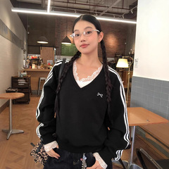 黒いvネックの女性の春秋の新型のアメリカの蝶結びのコートのゆったりしたデザイン感の長袖の上着のファッション