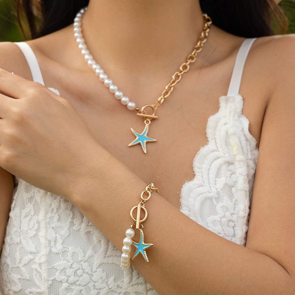 Set gioielli donna collana croce stella e perle sintetiche_voghion.com