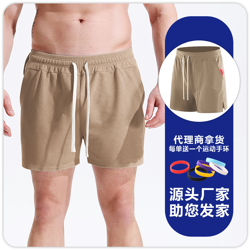 Pantalones cortos deportivos de waffle para hombres correr fútbol fitness deportes de secado rápido transpirable cómodos pantalones sueltos de cuartos delgados