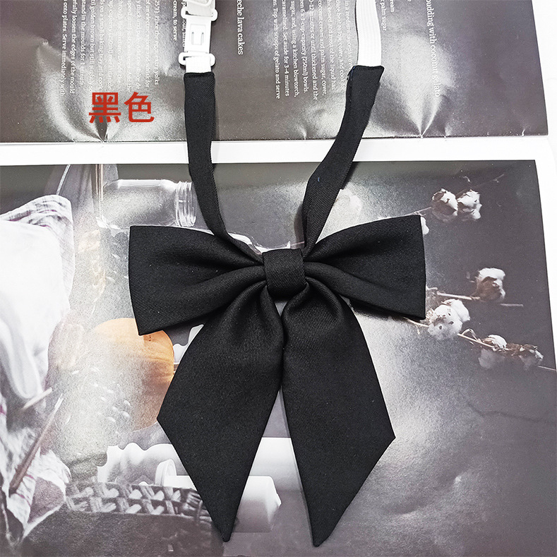 Spot al por mayor versión estrecha niña pequeña pajarita de raíz de plumas pajarita flor moda nuevo lazo color sólido jk pajarita satinado