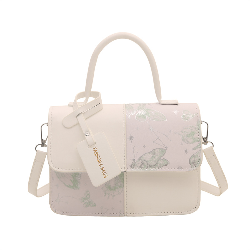 2026 nuevo paquete de hombro extranjero empalmado paquete de hombro de moda simple bolso de mano casual bolso pequeño transfronterizo
