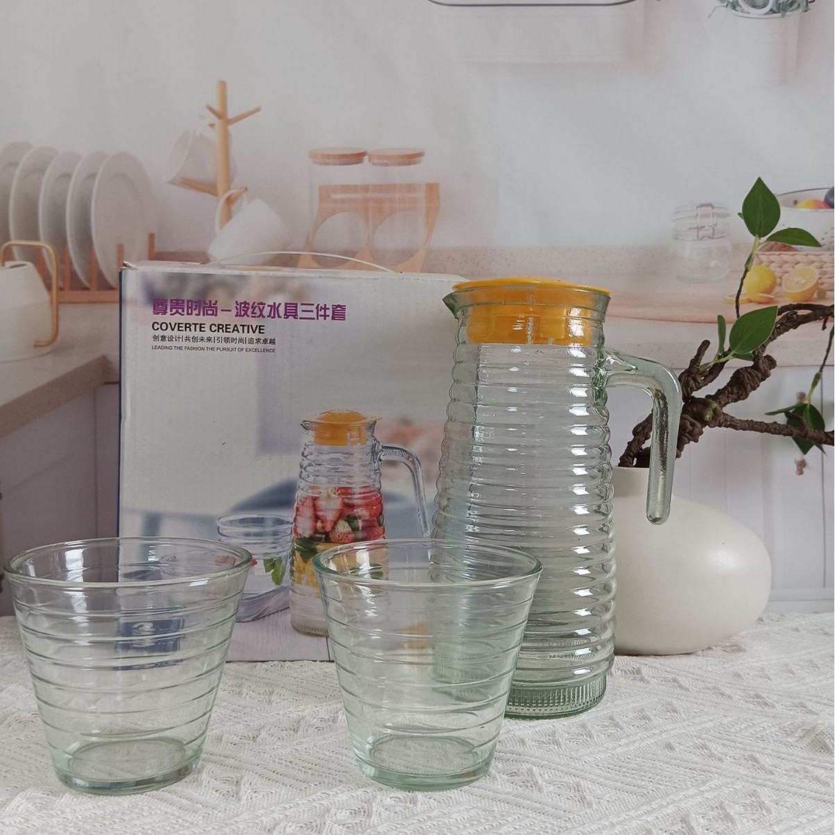 Botella de agua fría de vidrio simple regalo octogonal olla de pico de pato corrugado conjunto de agua al por mayor de gran capacidad traje de botella de agua fría