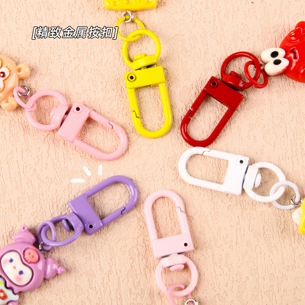 Nuevo estilo de dibujos animados estudiantes llaveros lindos colgantes de resina accesorios bolsos escolares amigos regalos llaveros al por mayor