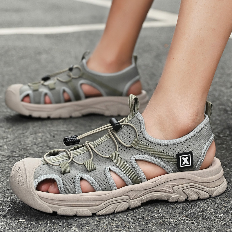 2025 verano baotou sandalias transpirables zapatos de playa al aire libre de tamaño grande tendencia explosiva de comercio exterior zapatos casuales antideslizantes para hombres