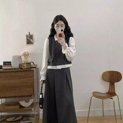 大きいサイズの女装の秋の新型の韓国版の復古の気質のスーツの太っているmmのデザイン感は色の上着の半分のスカートにぶつかります。