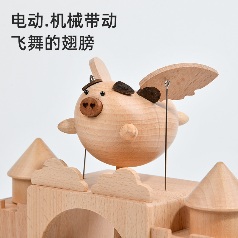 Venta directa de fábrica Mu Xiaofei Pig Adornos creativos para el hogar Regalos voladores Pig Artesanía de madera hecha a mano Caja de música