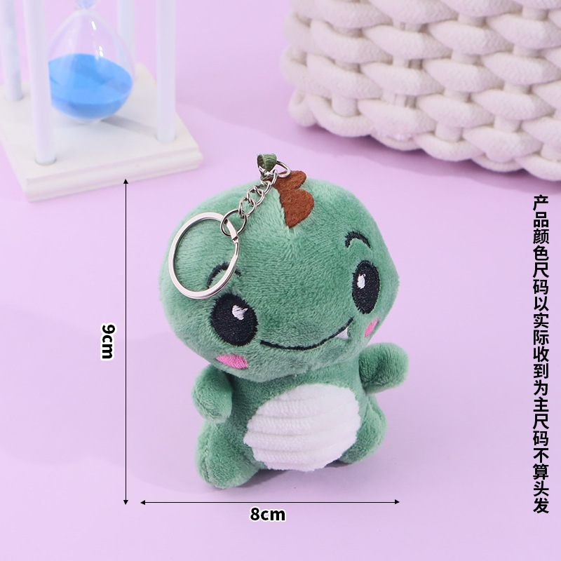 Lindo rubor pequeño sentado dinosaurio llavero de felpa bolso escolar colgante colgante máquina de garras muñeca muñeca regalo