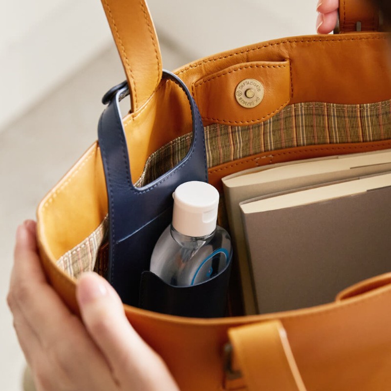 创意包包挂件手机袋便携带皮革洗手液存储套方块形洗手液瓶收纳包