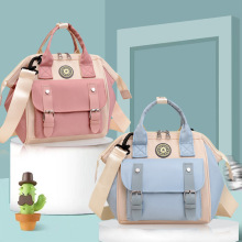 妈咪妈妈母婴外出双肩背包 搭扣复古新款时尚小号多用手提 斜跨包