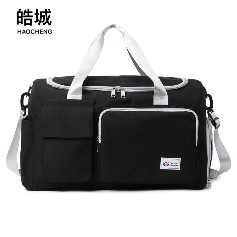 Nueva bolsa de fitness deportiva portátil simple, almacén de zapatos independiente de gran capacidad, bolsa de viaje de almacenamiento de equipaje portátil a prueba de salpicaduras