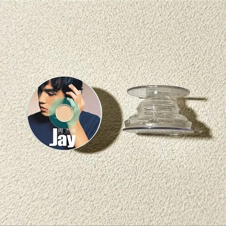 Grabación de CD vinilo redondo airbag soporte adhesivo tipo teléfono móvil adhesivo 360 ° giratorio telescópico succión magnética de corriente de marea