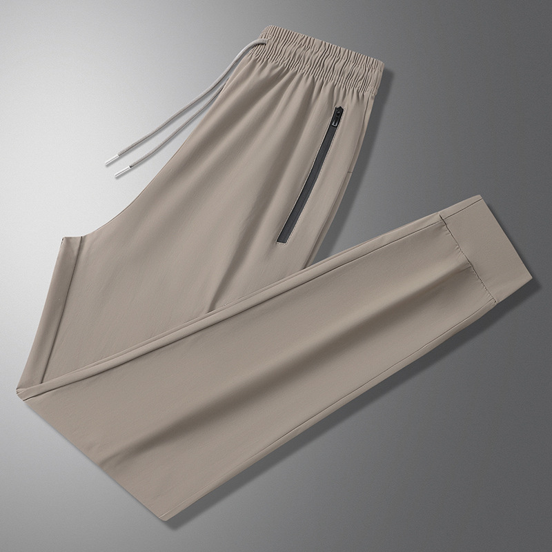 Pantalones de verano para hombres pantalones casuales pantalones deportivos sueltos nuevos tipos coreanos de hielo húmedo delgado pantalones de aire acondicionado pantalones