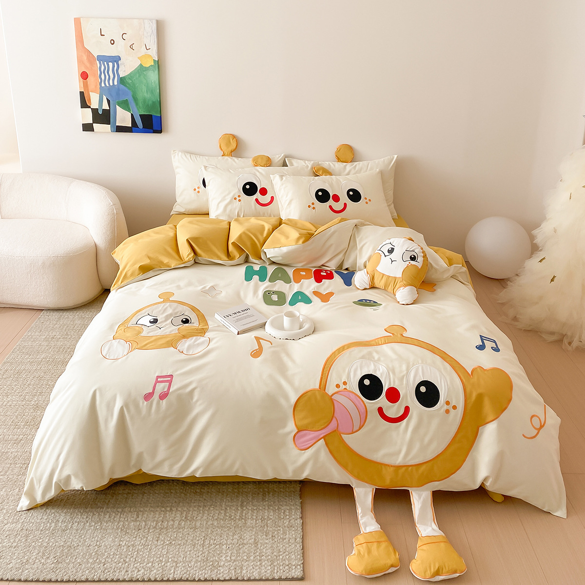 A set of cute embroidered cotton sheet set for children with a playful cartoon design, including a quilt cover and two pillowcases, all made of 100% cotton, plus an additional throw pillow.