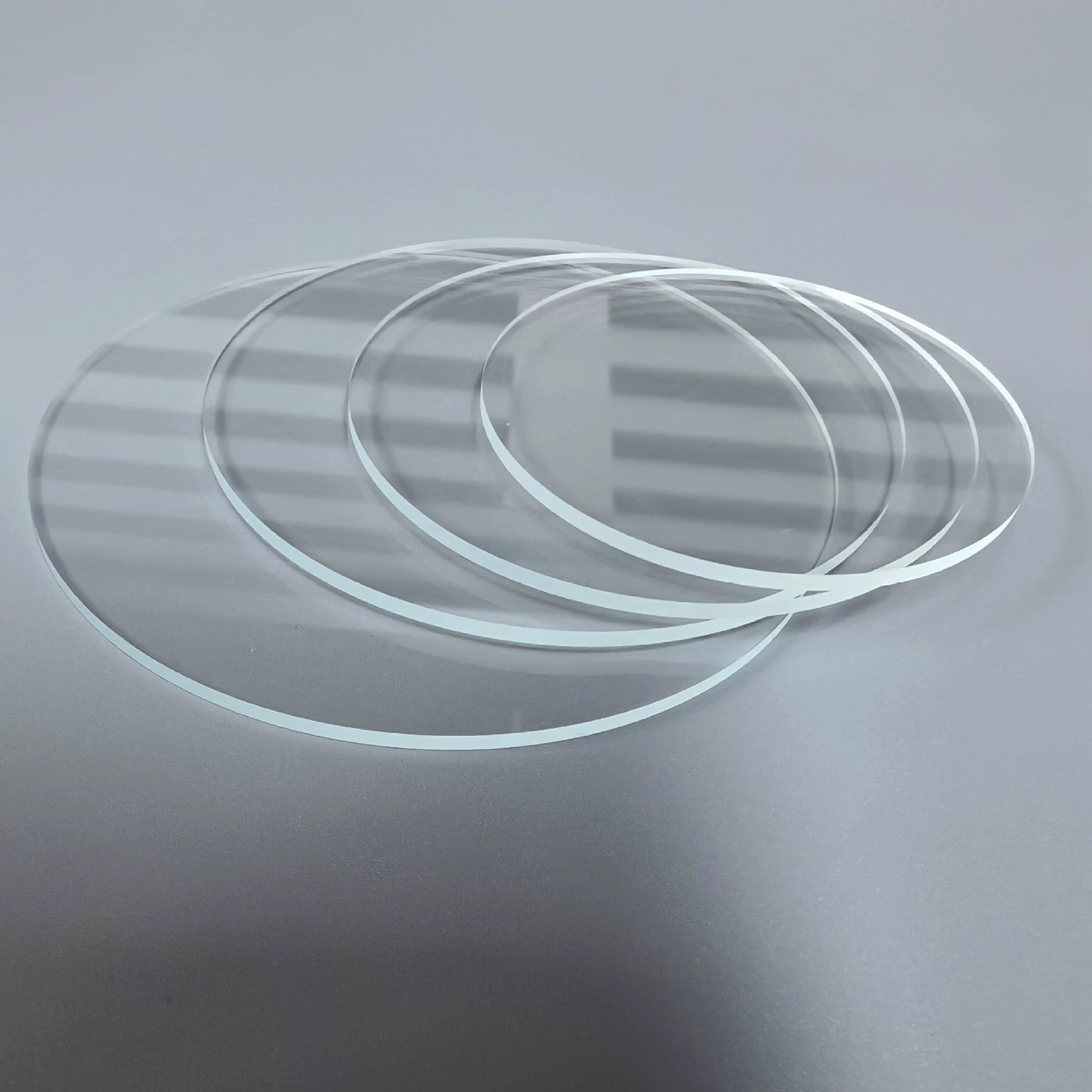 Профессиональная обработка и производство: резка и снятия фасок стеклянных крышек объективов прецизионных приборов, включая объективы камер и фонарики.