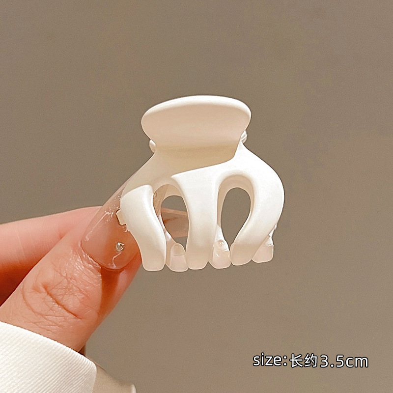 La misma horquilla de artefacto de cola de caballo alta de esta mañana cabeza trasera femenina agarre de tamaño pequeño clip de garra anti-flacidez